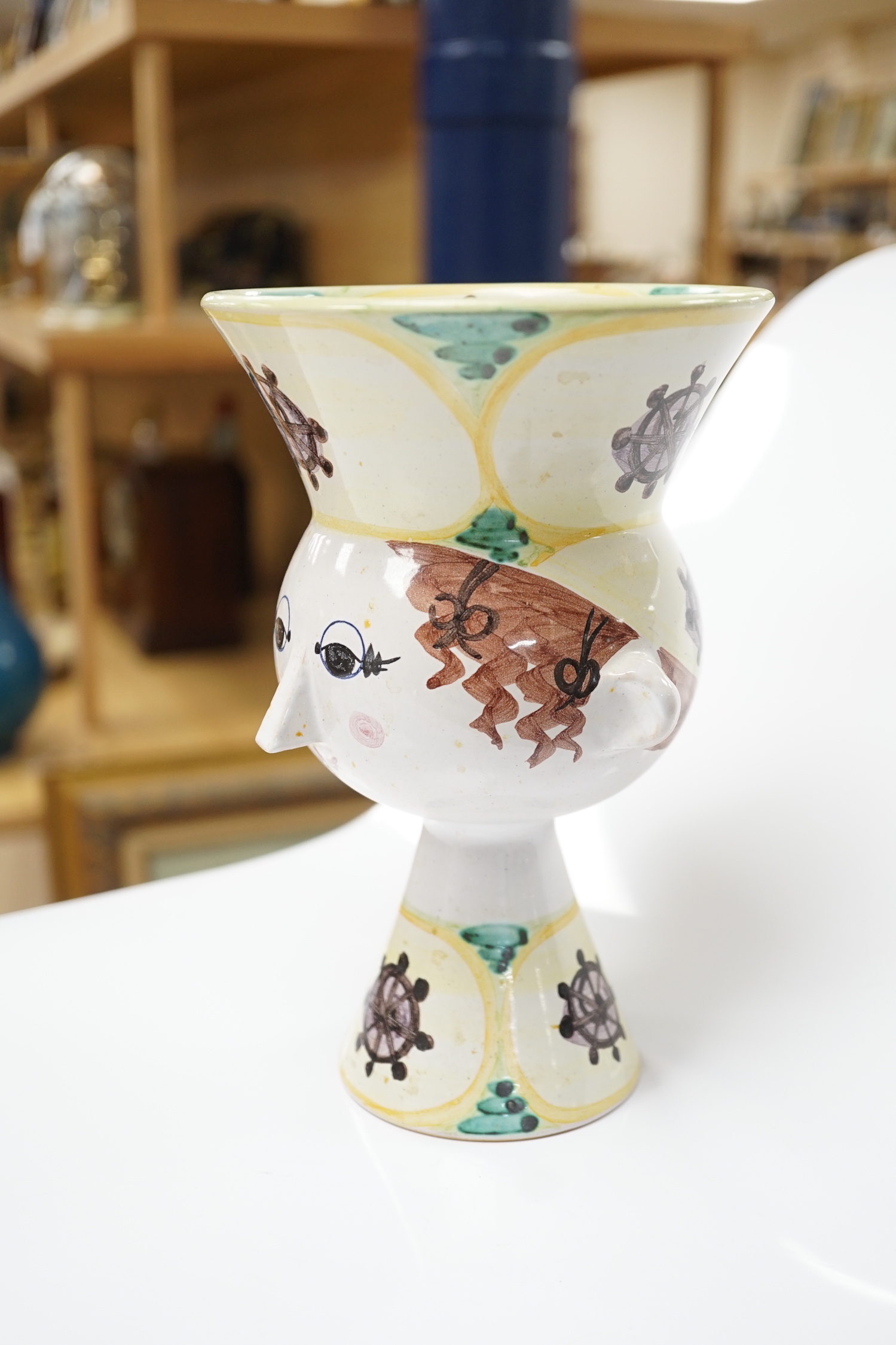 A Bjørn Wiinblad, Denmark vase in the form of a female head with large hat, 20.5cm